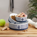 Ceramic Pet Bowl Set, striped design stacked, filled with dog treats and kibble, perfect for food and water use.