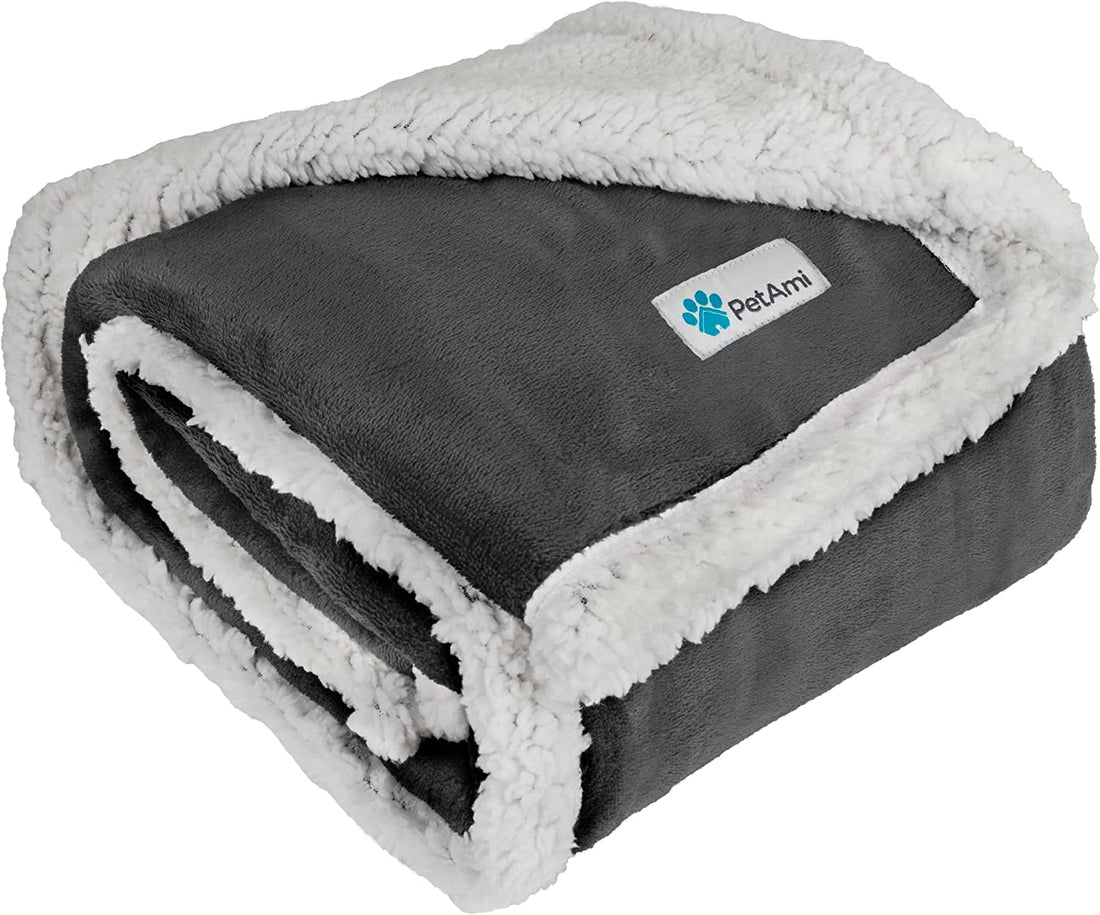 Thick reversible sherpa dog blanket folded showing soft gray fleece side and plush white sherpa lining for pet comfort