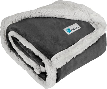 Thick reversible sherpa dog blanket folded showing soft gray fleece side and plush white sherpa lining for pet comfort