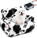Dog booster car seat for small dogs with a cozy design and a white fluffy dog inside for secure travel.