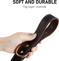 Hand holding a Genuine Leather Heavy Duty Dog Collar showcasing its soft and durable top layer cowhide.