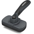 Self-cleaning slicker brush for dogs and cats with ergonomic handle and self-cleaning button.