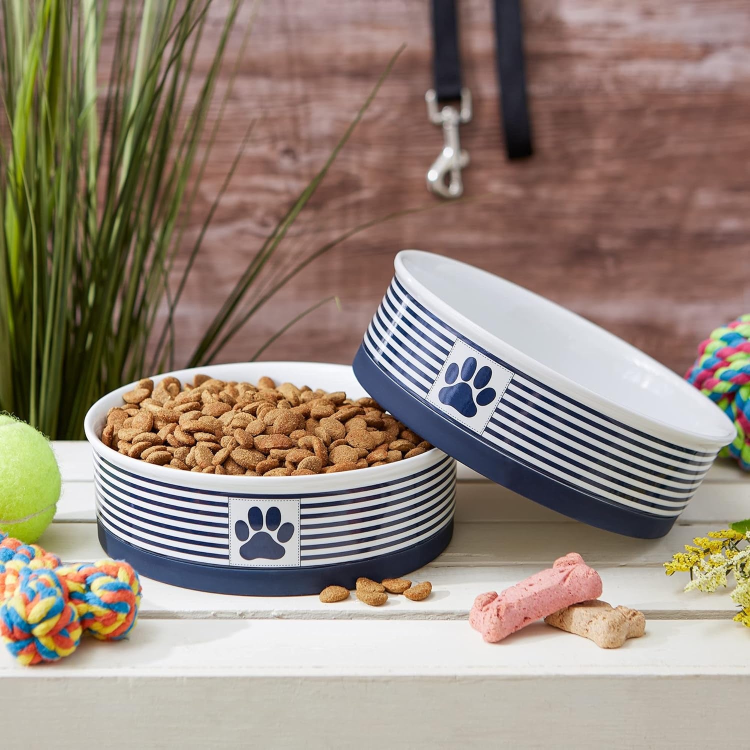Ceramic Pet Bowl Set for Food and Water with striped design and paw print, perfect for pet feeding.