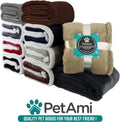 Stack of thick reversible sherpa dog blankets in multiple colors folded and rolled showing soft fleece and plush sherpa material for pets