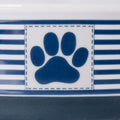 Ceramic Pet Bowl Set featuring a paw print design on a striped background for stylish pet feeding.