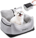 Dog booster car seat for small dogs with plush bedding for comfortable travel.