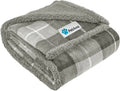 Gray plaid reversible sherpa dog blanket folded showing soft plush sherpa lining and patterned fleece exterior for pet comfort and furniture protection